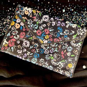 Rebecca Minkoff Leo Clutch – Black/Floral Coated Canvas with Zipper Trim